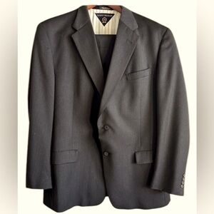 Tommy Hilfiger suit. 2pc Charcoal grey.  48Tall